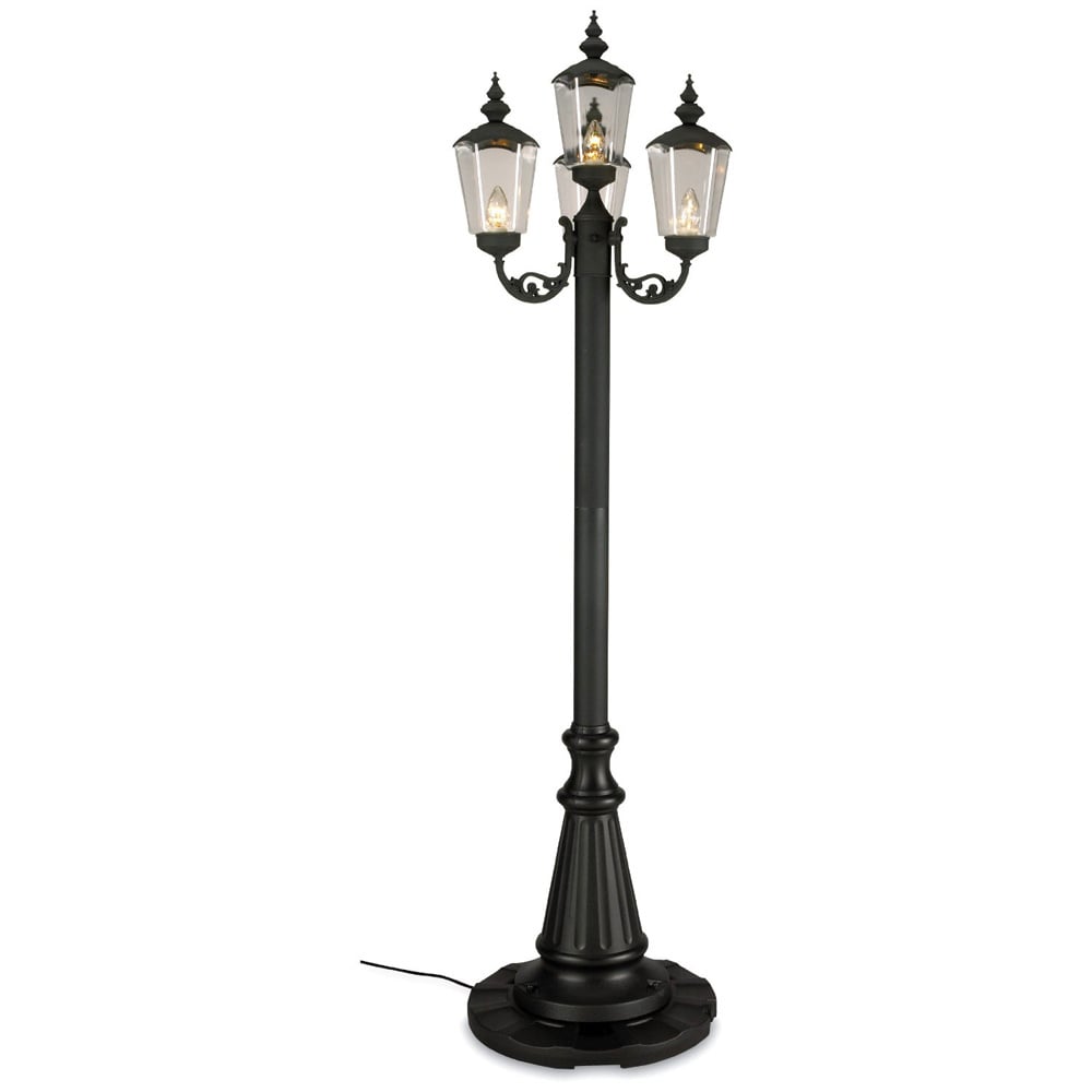 Black decorative street lamp with three clear lanterns and an ornate freestanding base.