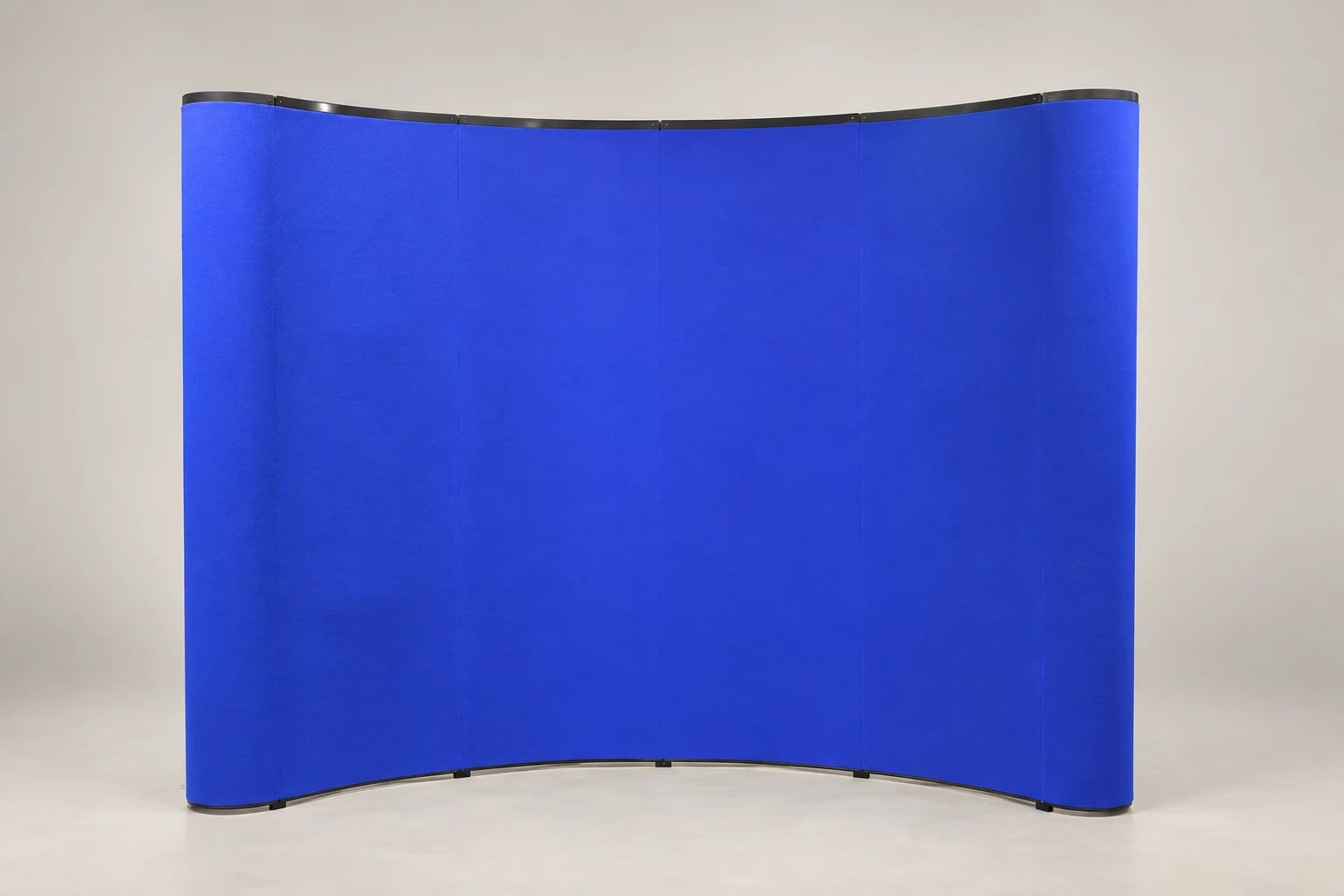 A curved blue fabric pop-up display with rounded side returns and thin black edging.